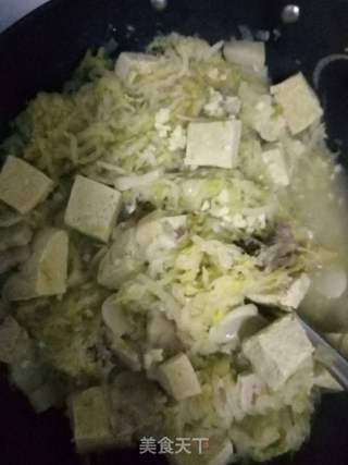 【东北】酸菜猪肉炖冻豆腐的做法步骤:9