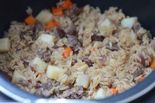 土豆牛肉焖饭的做法步骤:7