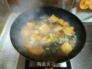 鲤鱼炖豆腐的做法步骤:12