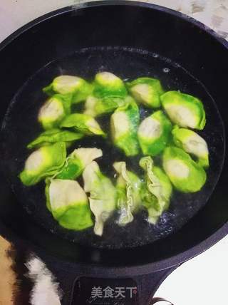 ＃春食野菜香＃餐桌上的春天-荠菜牛肉饺子的做法步骤：28