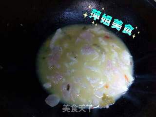 酸菜鱼片味美鲜香的做法步骤:12