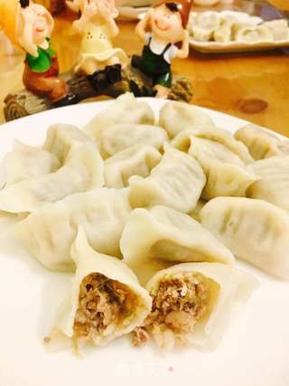 酸菜饺子的做法步骤:9