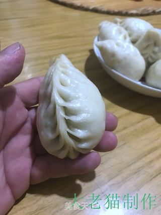 萝卜缨包子的做法步骤:18
