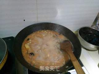 牛骨西红柿黄豆煲的做法步骤:11