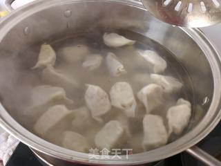 东北酸菜猪肉水饺的做法步骤:22