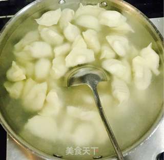 酸菜饺子的做法步骤:11