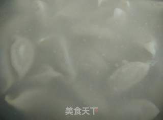 猪肉酸菜饺子的做法步骤:11