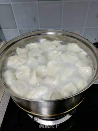御寒美食-猪肉酸菜水饺的做法步骤:11