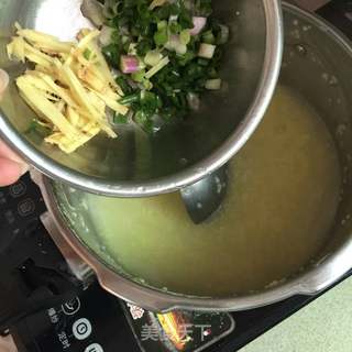 小米花蛤粥的做法步骤:5