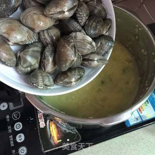 小米花蛤粥的做法步骤:7