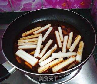 香菇豆豉辣酱炒年糕的做法步骤:6