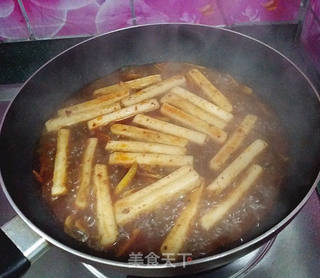 香菇豆豉辣酱炒年糕的做法步骤:7