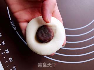 小猪豆沙包的做法步骤:17