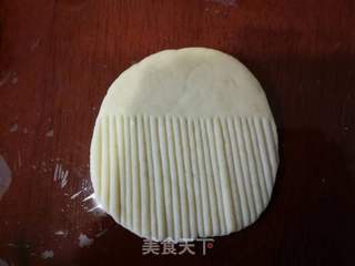 小贝壳馒头的做法步骤:7