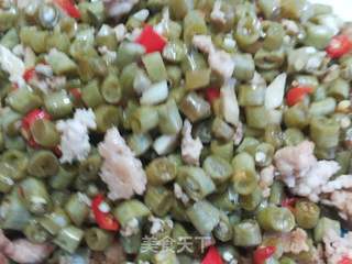 酸豆角炒肉末(附酸豆角快速的做法)的做法步骤:11
