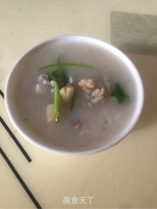 排骨干鱿鱼瑶柱砂锅粥的做法步骤：7