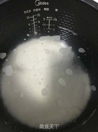 鱿鱼海鲜粥的做法步骤:4