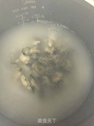 鱿鱼海鲜粥的做法步骤:10