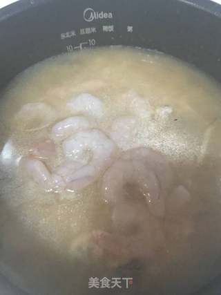 鱿鱼海鲜粥的做法步骤:14