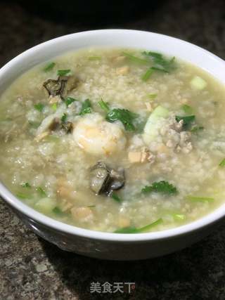 鱿鱼海鲜粥的做法步骤:19