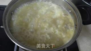 双蛋瘦肉粥的做法步骤：9