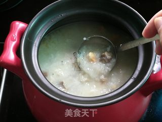 蚝豉鱿鱼咸蛋粥的做法步骤:11