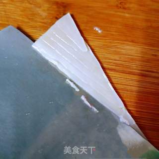 鱿鱼炒荷兰豆(如何泡发干鱿鱼)的做法步骤:4