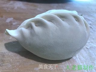 扇贝萝卜丝包子的做法步骤:22