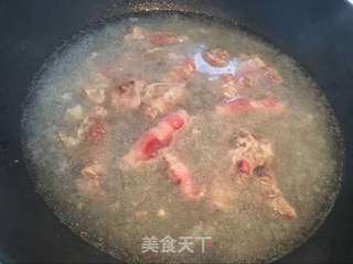 酸汤金针肥牛的做法步骤:7