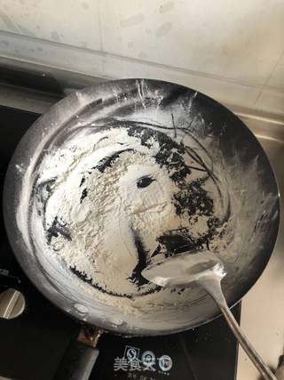 糖霜花生的做法步骤:2