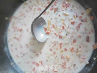 早餐必备的减肥餐------地瓜胡萝卜牛奶燕麦粥的做法步骤:7