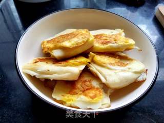 “家乡美食”鹌鹑蛋煎馒头片的做法步骤：5