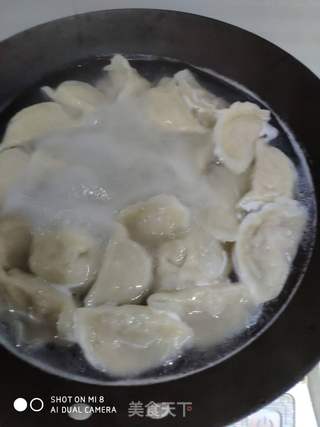 酸菜水饺的做法步骤:11