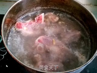 花生咸骨粥的做法步骤:4