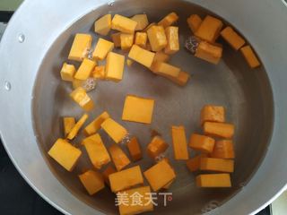 南瓜花生粥的做法步骤:4