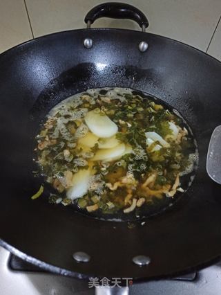 雪菜肉丝炒年糕的做法步骤:8