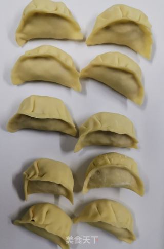 猪肉酸菜饺子的做法步骤:10