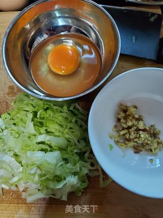 风姜鸡蛋粥的做法步骤:2