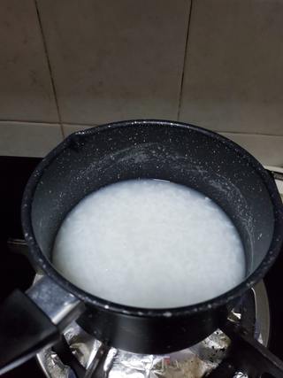 滑鸡皮蛋粥的做法步骤:5