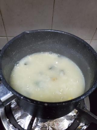 滑鸡皮蛋粥的做法步骤:8