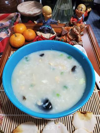 滑鸡皮蛋粥的做法步骤:11