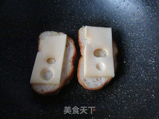 鸡蛋奶酪三明治的做法步骤:7