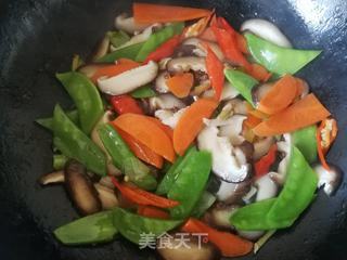 荷兰豆胡萝卜炒香菇的做法步骤:11