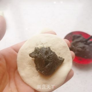 黑芝麻花生馅包子的做法步骤:11