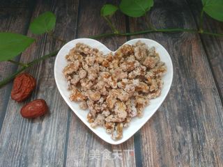 糖霜核桃仁的做法步骤:10