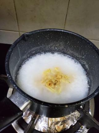 瑶柱粥的做法步骤:6