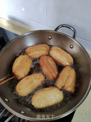 炸油条的做法步骤:11