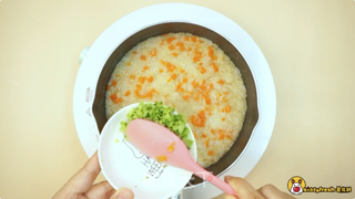 时蔬鳕鱼松蛋黄粥的做法步骤:7