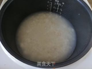 青菜鸡肉粥的做法步骤：1