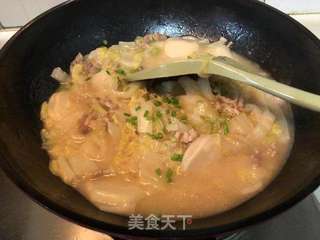 白菜肉丝炒年糕的做法步骤:9
